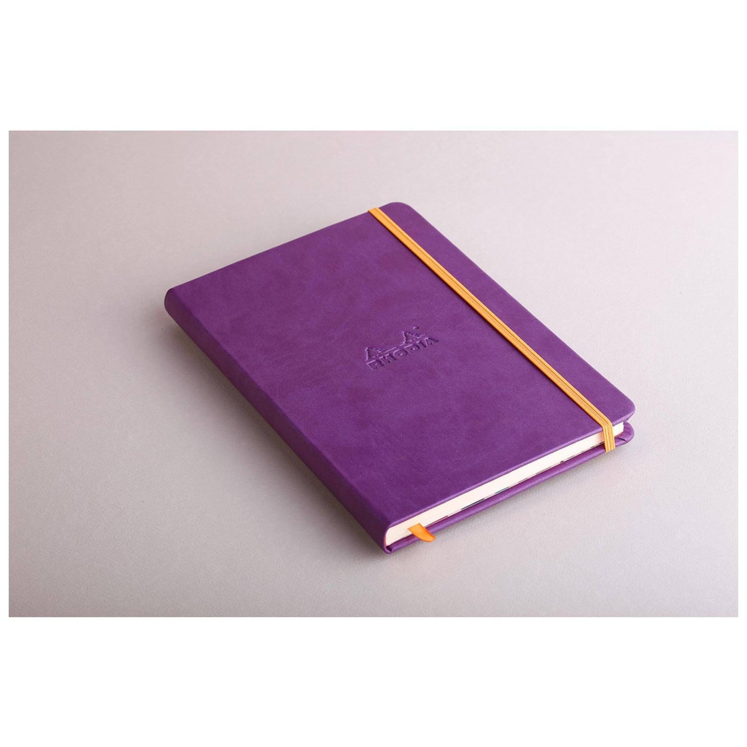 Caiet Agenda A5 Rhodiarama liniat, violet, 96 pagini, cu coperta rigida + elastic Agenda Rhodia